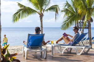 Private beach, sun-loungers, beach towels, windsurfing