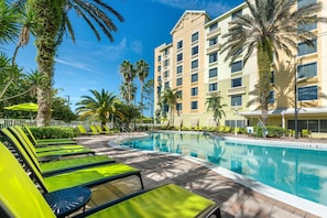 Outdoor pool, pool umbrellas, sun loungers
