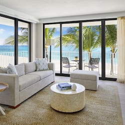 1 Bedroom Regal Suite | Living area | 32-inch flat-screen TV with cable channels, TV, iPod dock