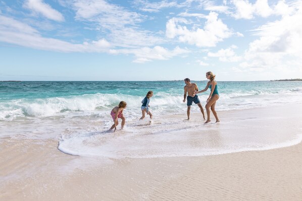 Private beach, white sand, sun-loungers, beach towels
