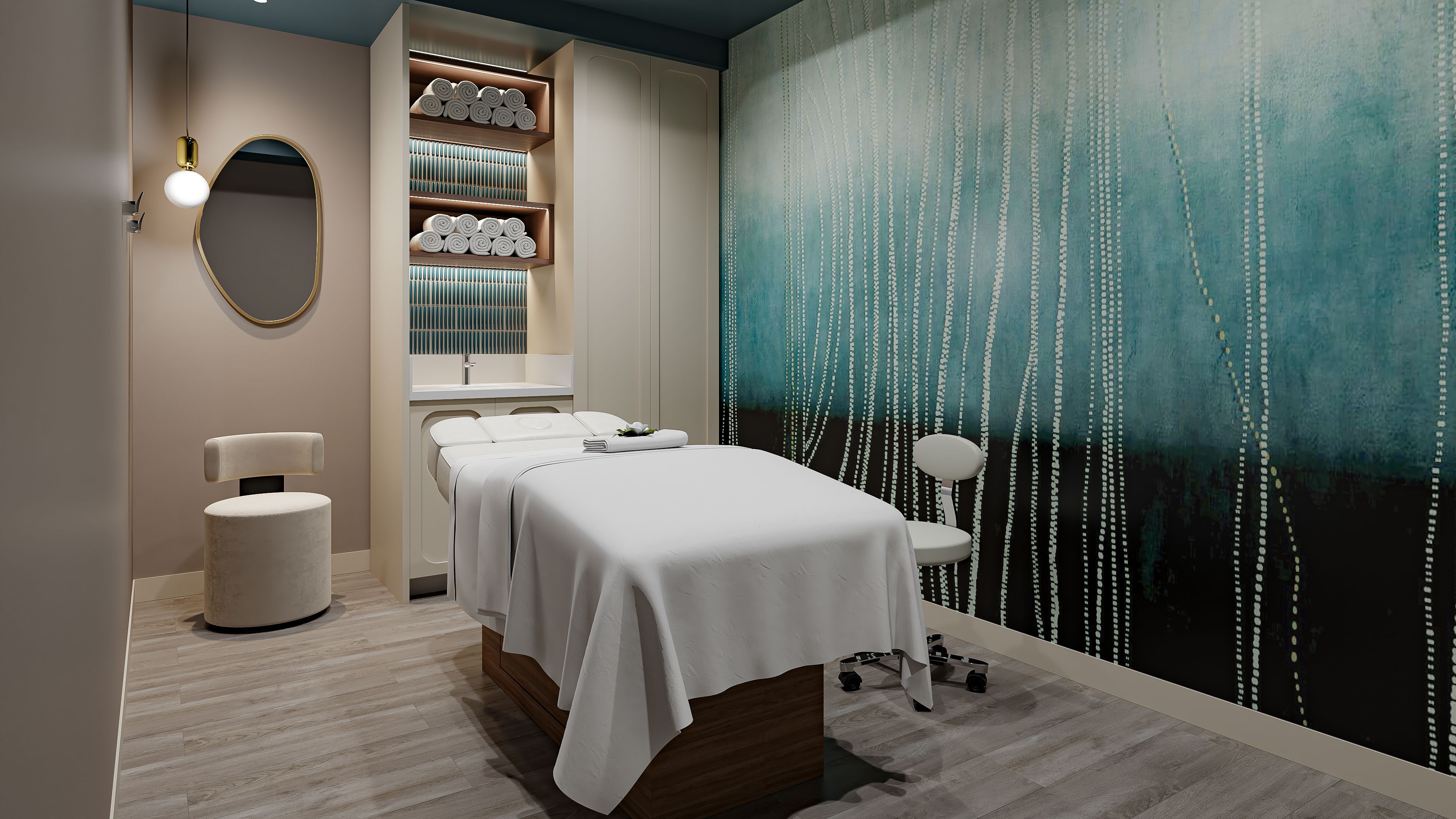 A spa room with a massage table, a wall-mounted shelf with towels, and a large abstract painting.