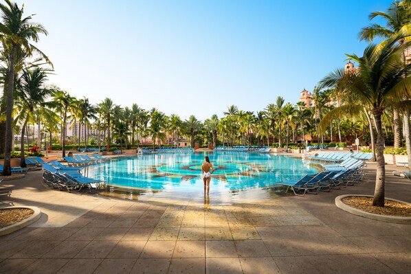 14 outdoor pools, open 9:00 AM to 6:00 PM, pool umbrellas, pool loungers