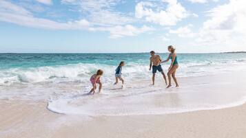 Private beach, white sand, sun loungers, beach towels