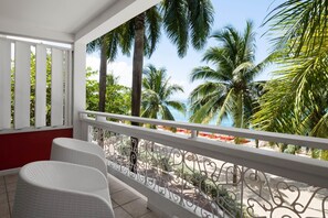 Room, 1 King Bed, Non Smoking, Ocean View | Down duvets, in-room safe, individually decorated - Grand Decameron Montego Beach, A Trademark All-Inclusive Resort (Montego Bay)