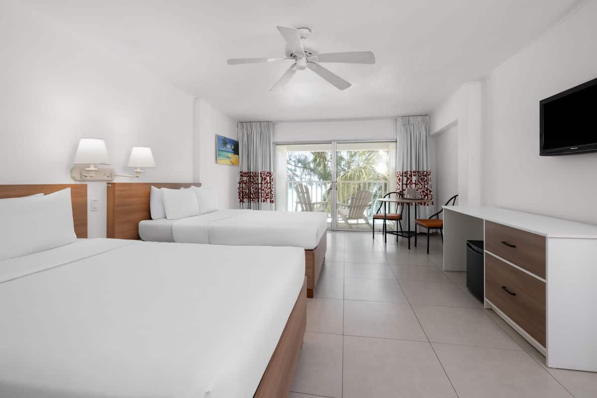 Room, 2 Double Beds, Non Smoking, Ocean View | Down comforters, in-room safe, individually decorated