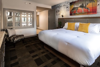 Tower Premium King | Premium bedding, desk, laptop workspace, blackout drapes at Silver Sevens Hotel & Casino