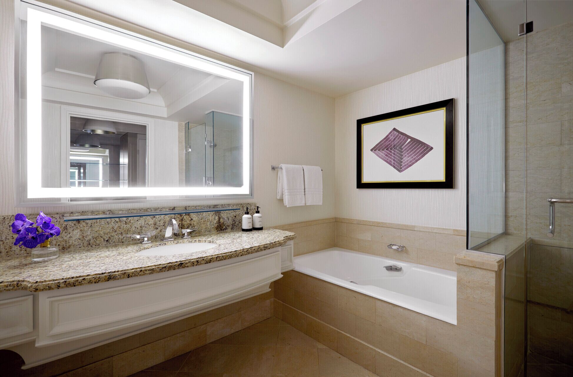 separate bathtub and shower, designer toiletries, hair dryer, bathrobes