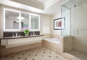 Separate tub and shower, designer toiletries, hair dryer, bathrobes at Four Seasons Hotel Las Vegas