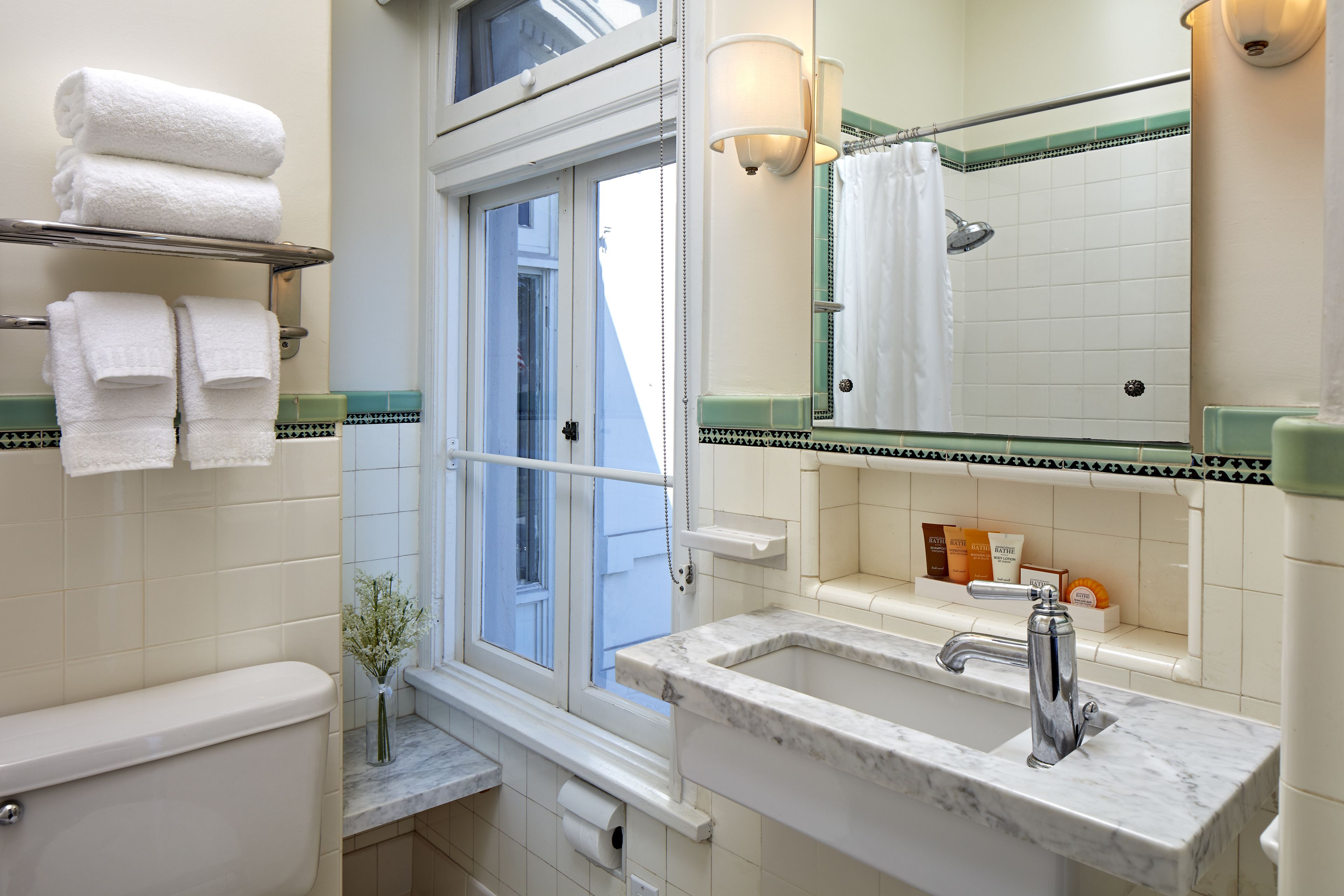 room (sunset) | bathroom | designer toiletries, hair dryer, bathrobes, towels