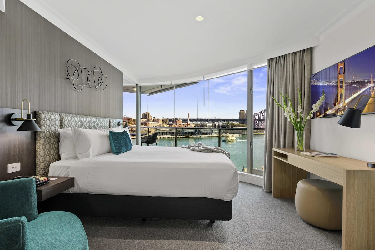 deluxe apartment, multiple beds, harbour view | 1 bedroom, premium bedding, minibar, in-room safe