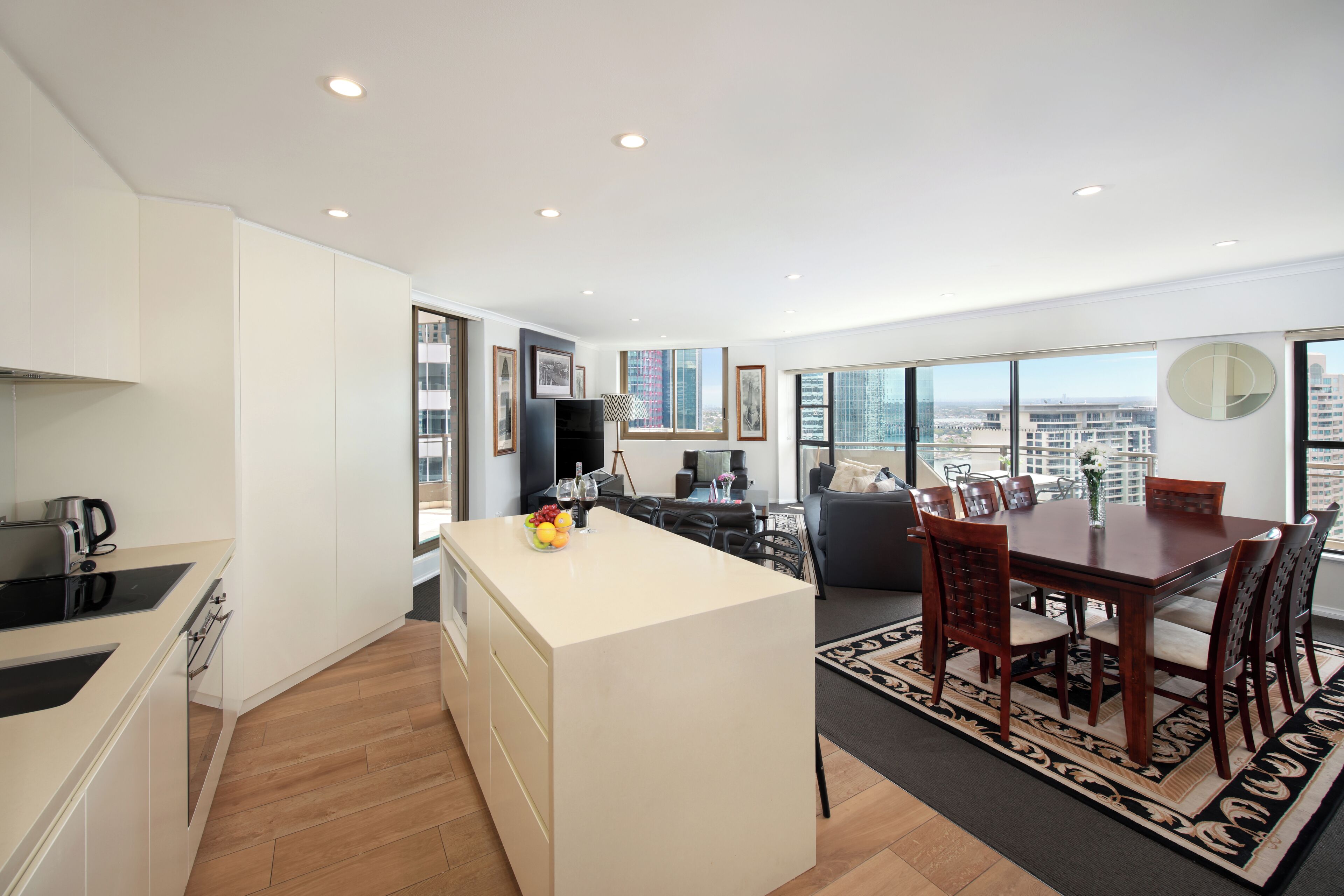 Penthouse Three Bedroom Apartment | Living area | 32-inch flat-screen TV with satellite channels, TV, DVD player