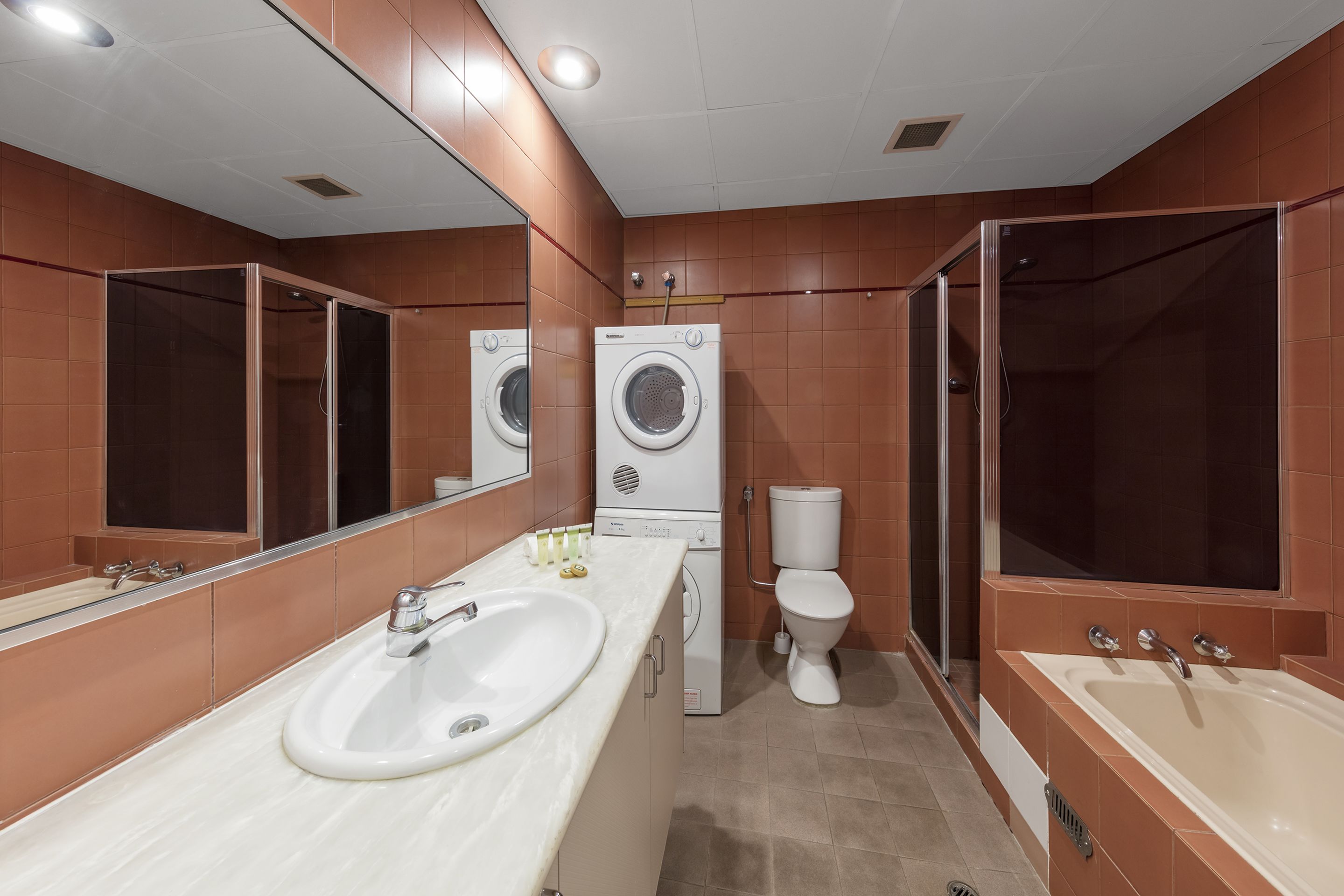 studio apartment | bathroom amenities | free toiletries, hair dryer, towels, soap