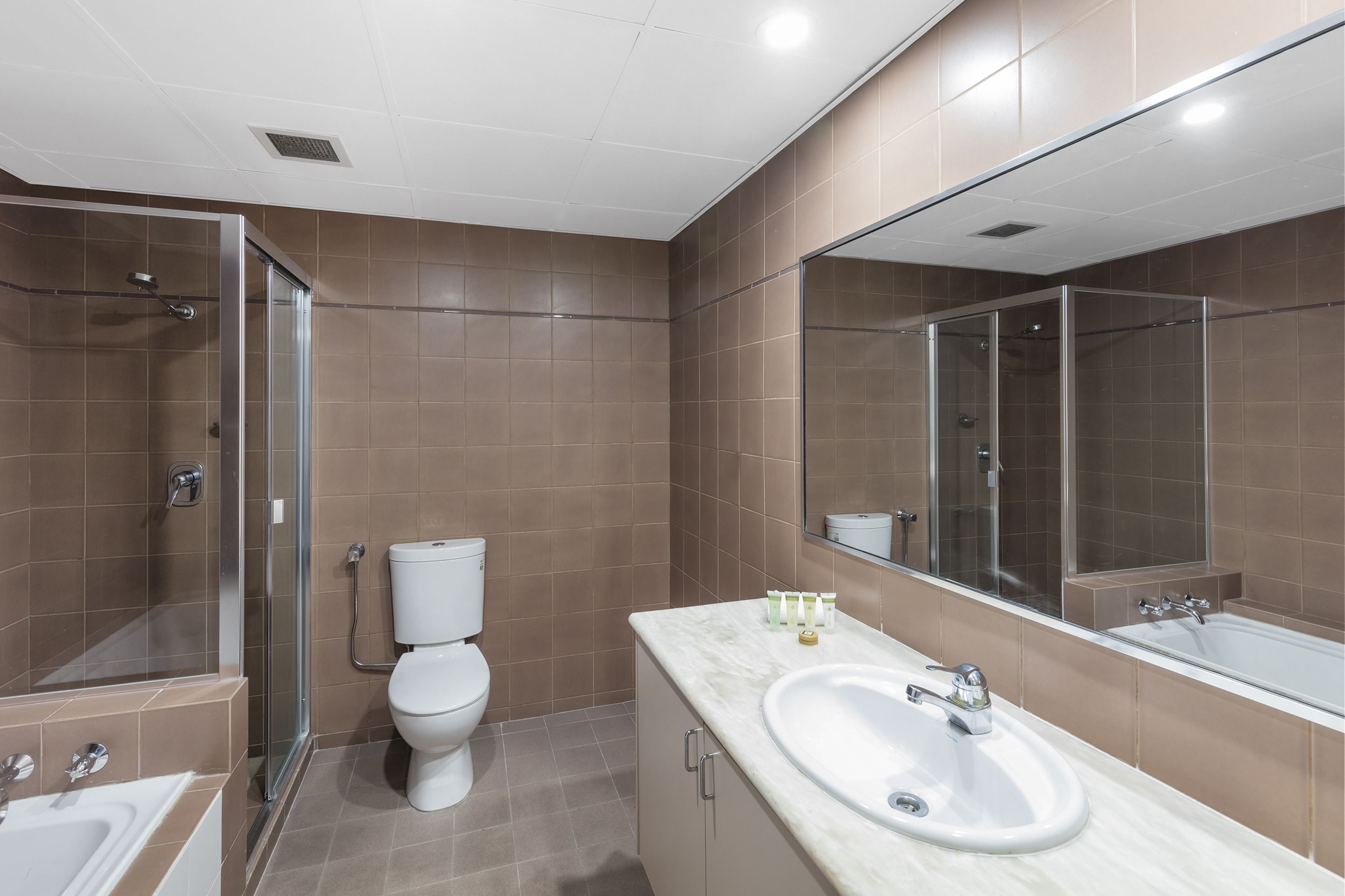 two bedroom apartment with balcony | bathroom | free toiletries, hair dryer, towels, soap