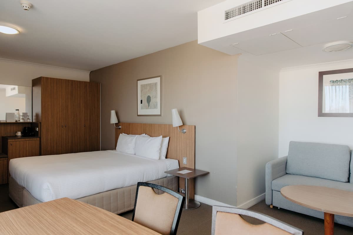 Junior Suite, 1 King Bed | In-room safe, individually furnished, desk, laptop workspace
