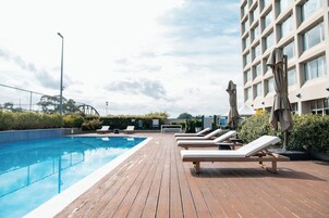 Outdoor pool, sun loungers