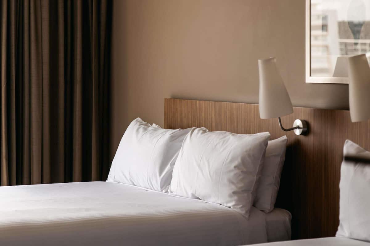 Classic Twin Room, 2 Double Beds | In-room safe, individually furnished, desk, laptop workspace