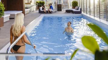 Outdoor pool, open 5:00 AM to 7:00 PM, sun loungers