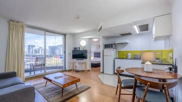 Superior Apartment, 1 Bedroom | Living area | TV