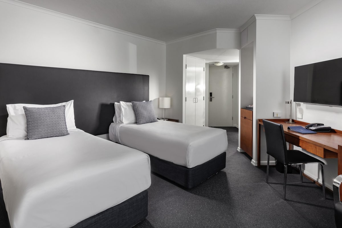 Standard Apartment, 2 Bedrooms | Minibar, desk, laptop workspace, blackout curtains