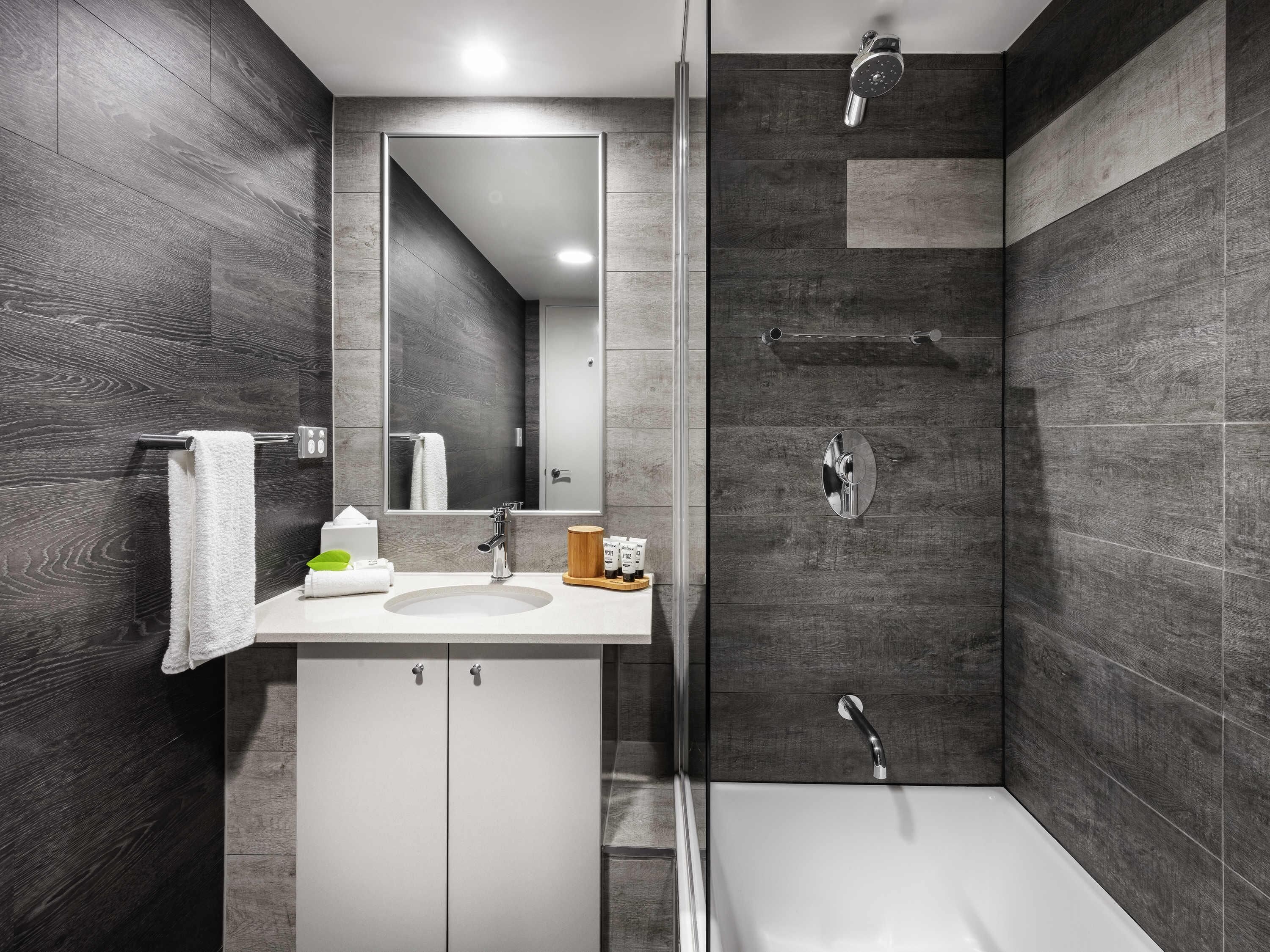 Combined shower/bathtub, free toiletries, hair dryer, bathrobes