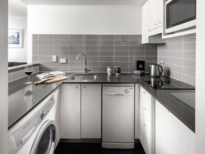 Minibar, desk, laptop workspace, blackout drapes