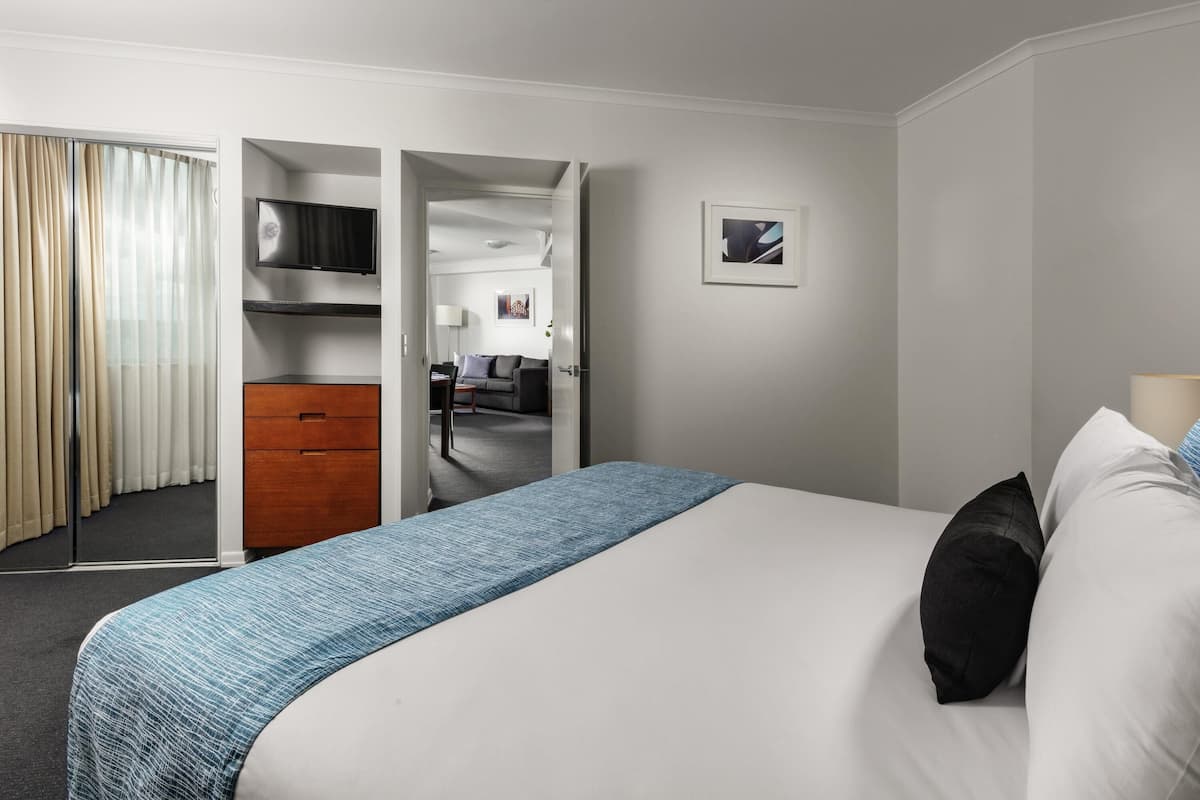 Premium Apartment, 1 Bedroom | Minibar, desk, laptop workspace, blackout drapes