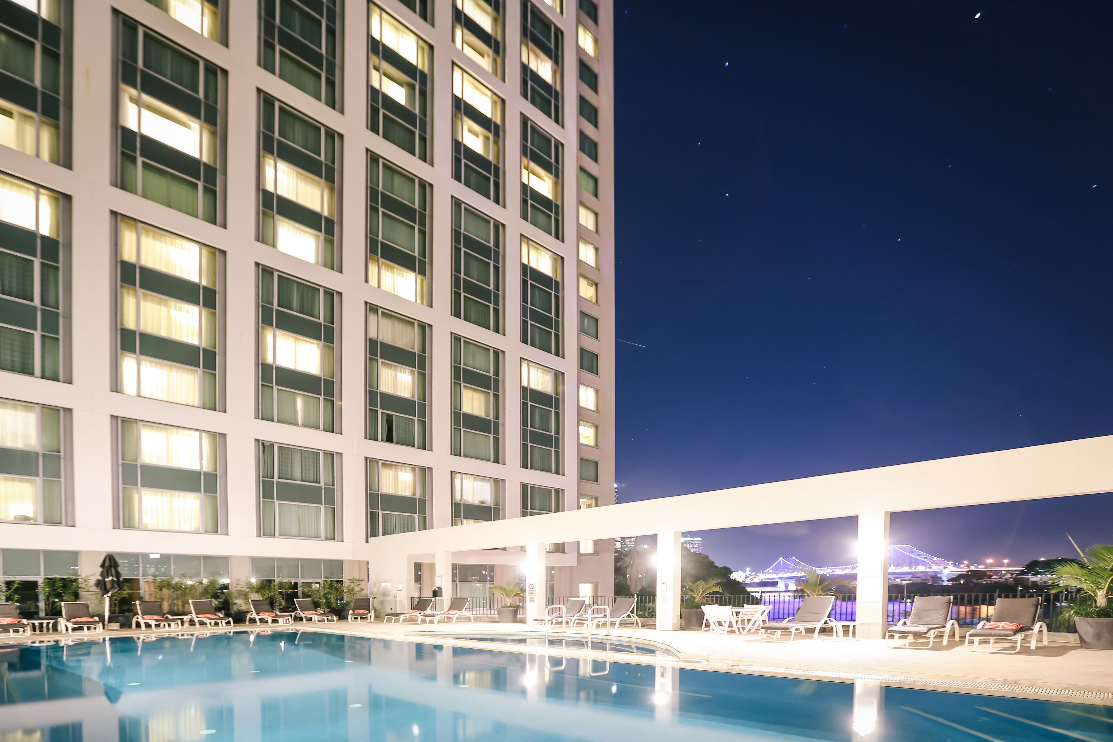 outdoor pool, pool umbrellas, pool loungers