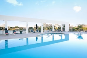 Outdoor pool, pool umbrellas, pool loungers