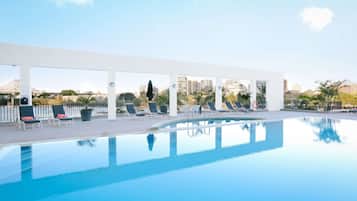 Outdoor pool, pool umbrellas, pool loungers