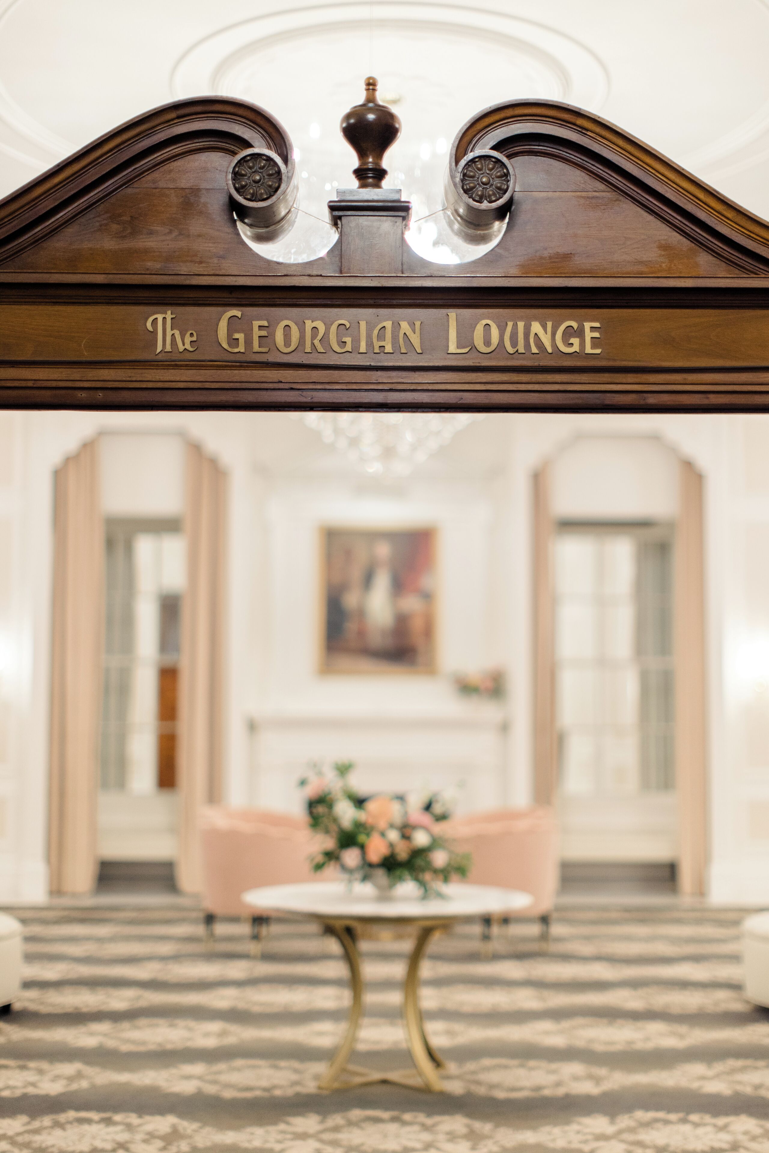A grand entrance with a sign reading "The Georgian Lounge."
