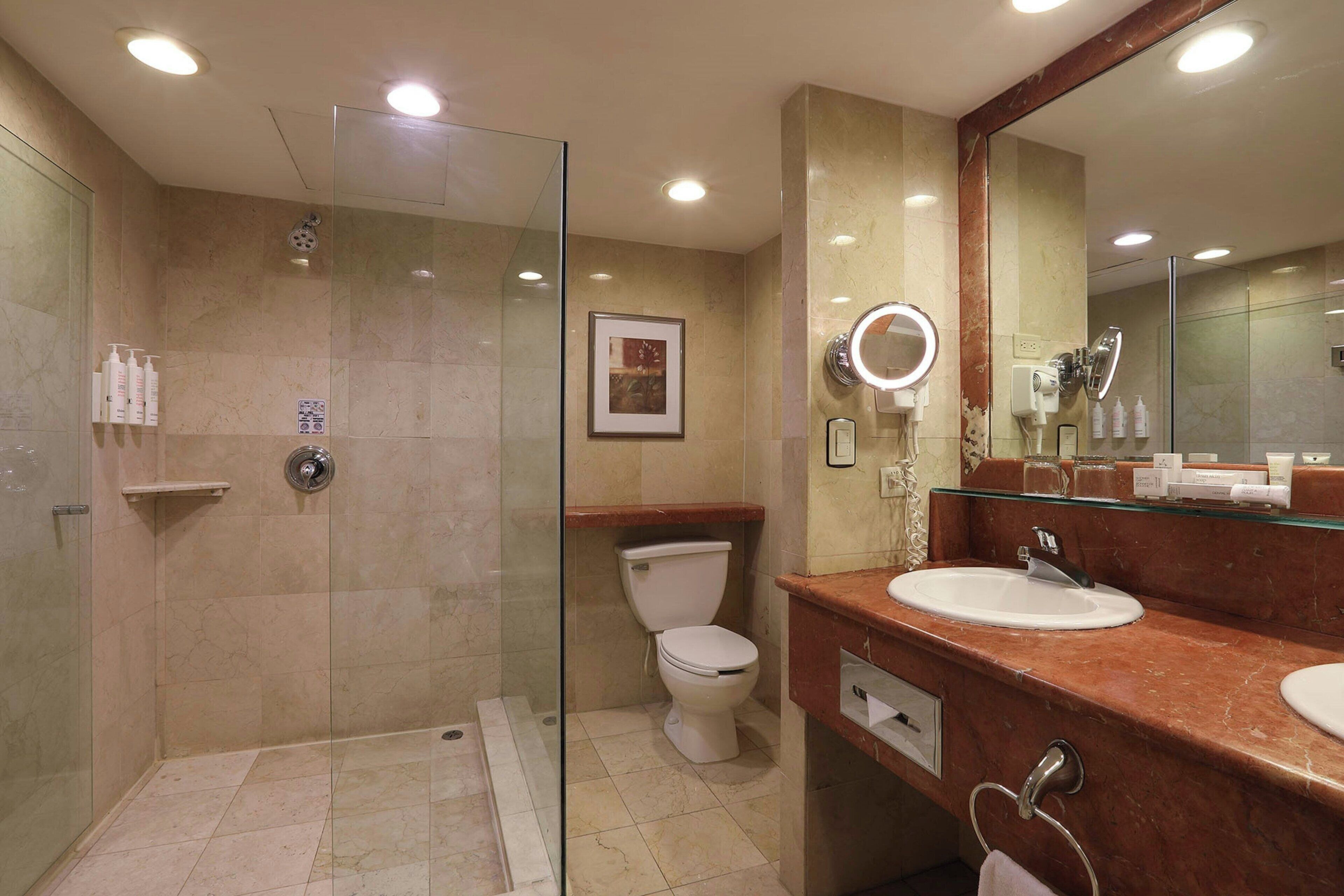 combined shower/bathtub, deep-soaking bathtub, free toiletries