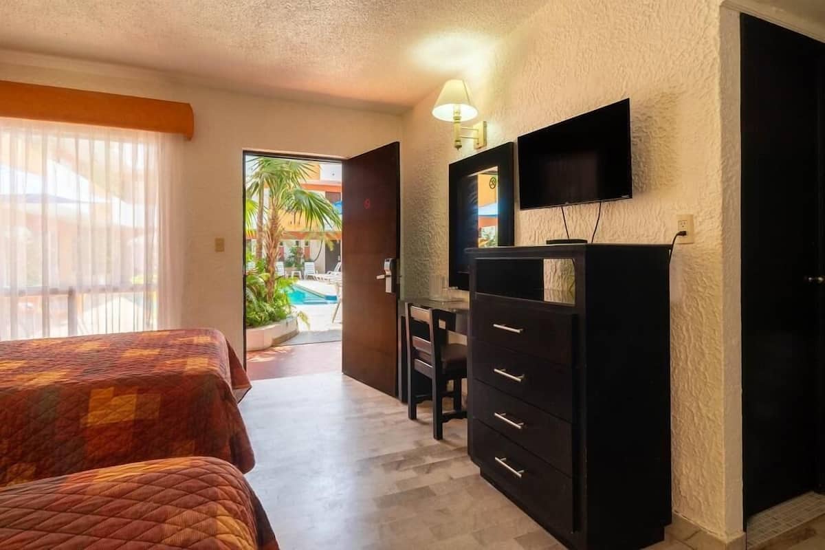 Desk, blackout drapes, iron/ironing board, WiFi (free)