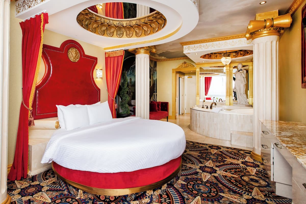 Roman Theme Room | In-room safe, blackout drapes, iron/ironing board, cribs (free)