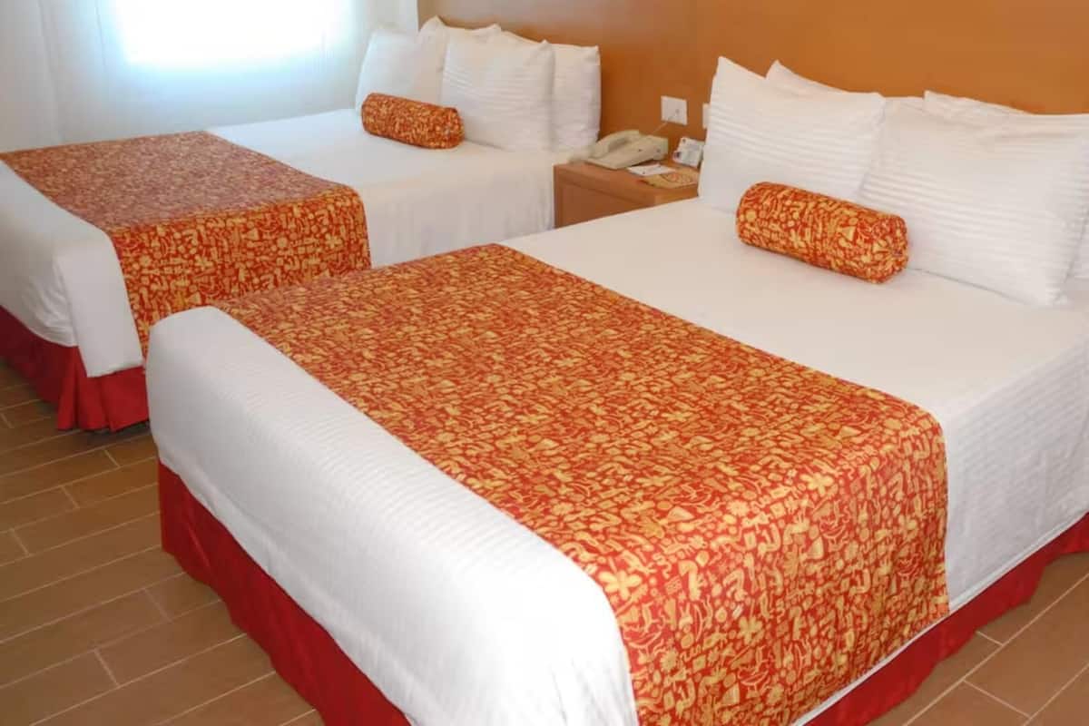 Caja fuerte, escritorio, wifi gratis y ropa de cama