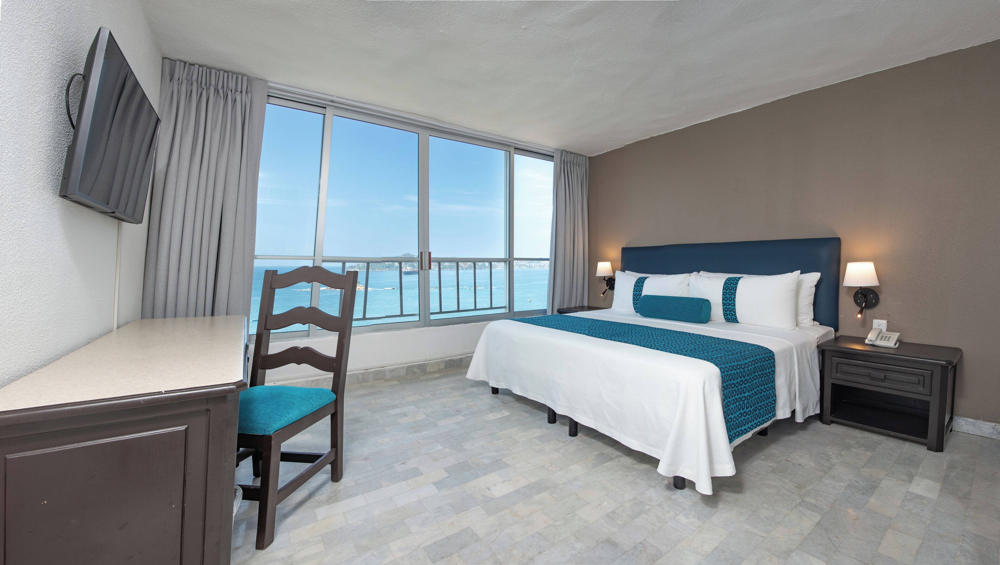 Standard Single Room, 1 King Bed, Partial Sea View | In-room safe, desk, laptop workspace, blackout drapes