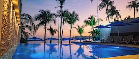 2 outdoor pools, pool umbrellas, pool loungers