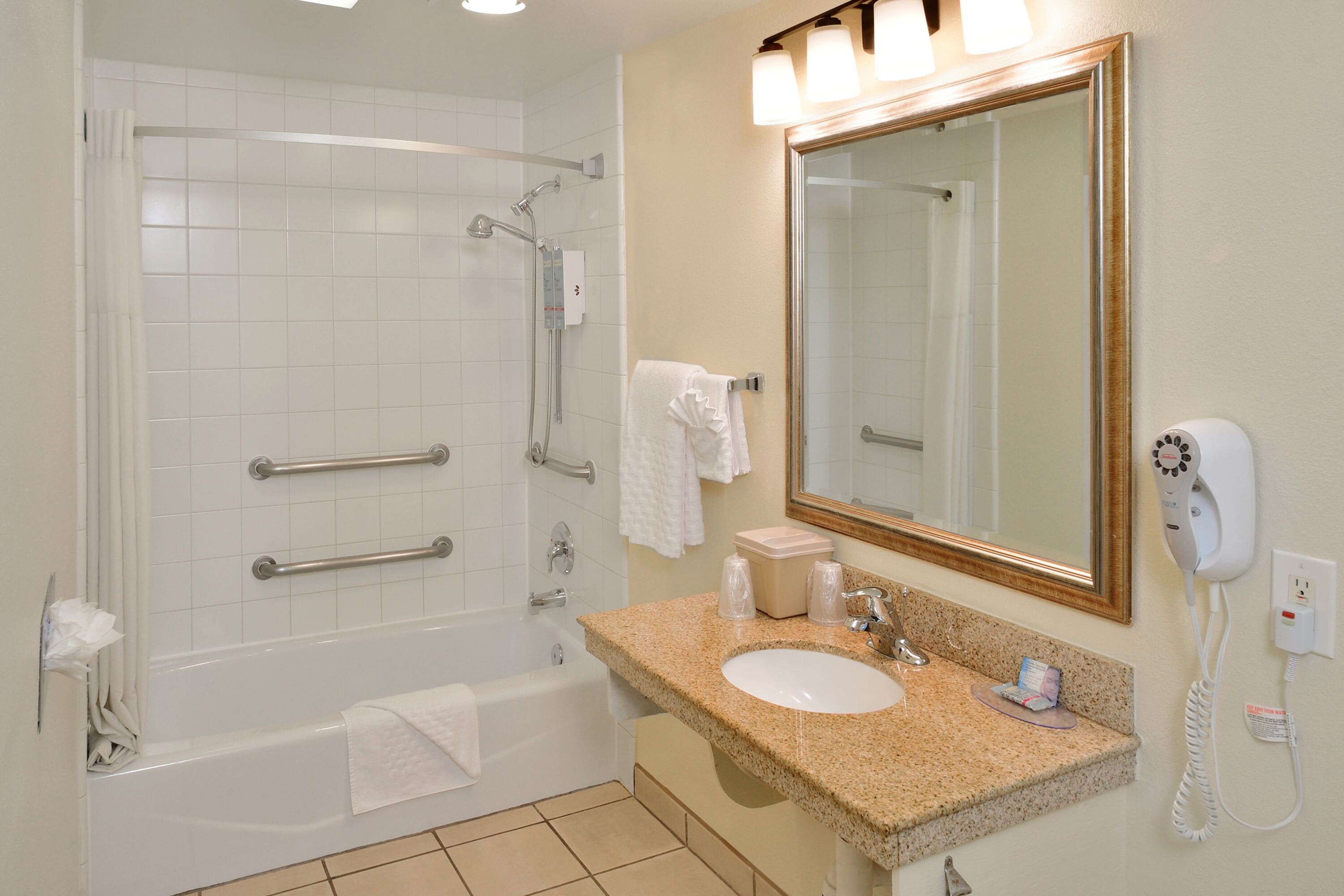 single king room, accessible w/ bathtub | bathroom | free toiletries, hair dryer, towels