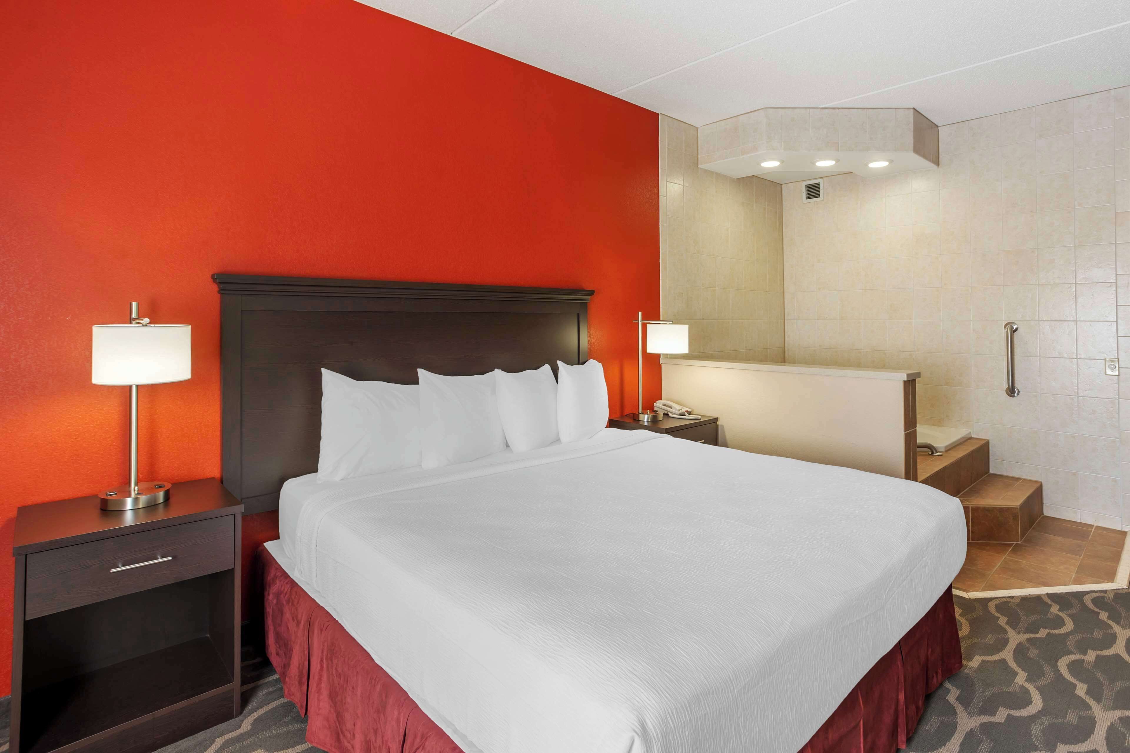 laptop workspace, blackout curtains, iron/ironing board