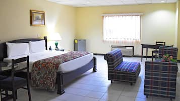 Suite, 1 King Bed | In-room safe, desk, free WiFi, alarm clocks