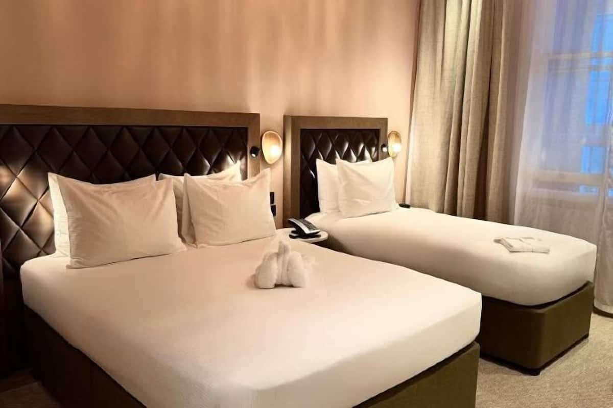 Egyptian cotton sheets, premium bedding, in-room safe, blackout drapes