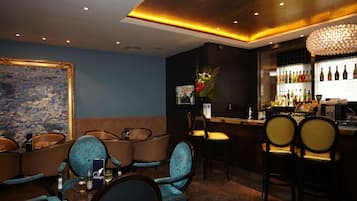 A bar area with seating and a bar counter.