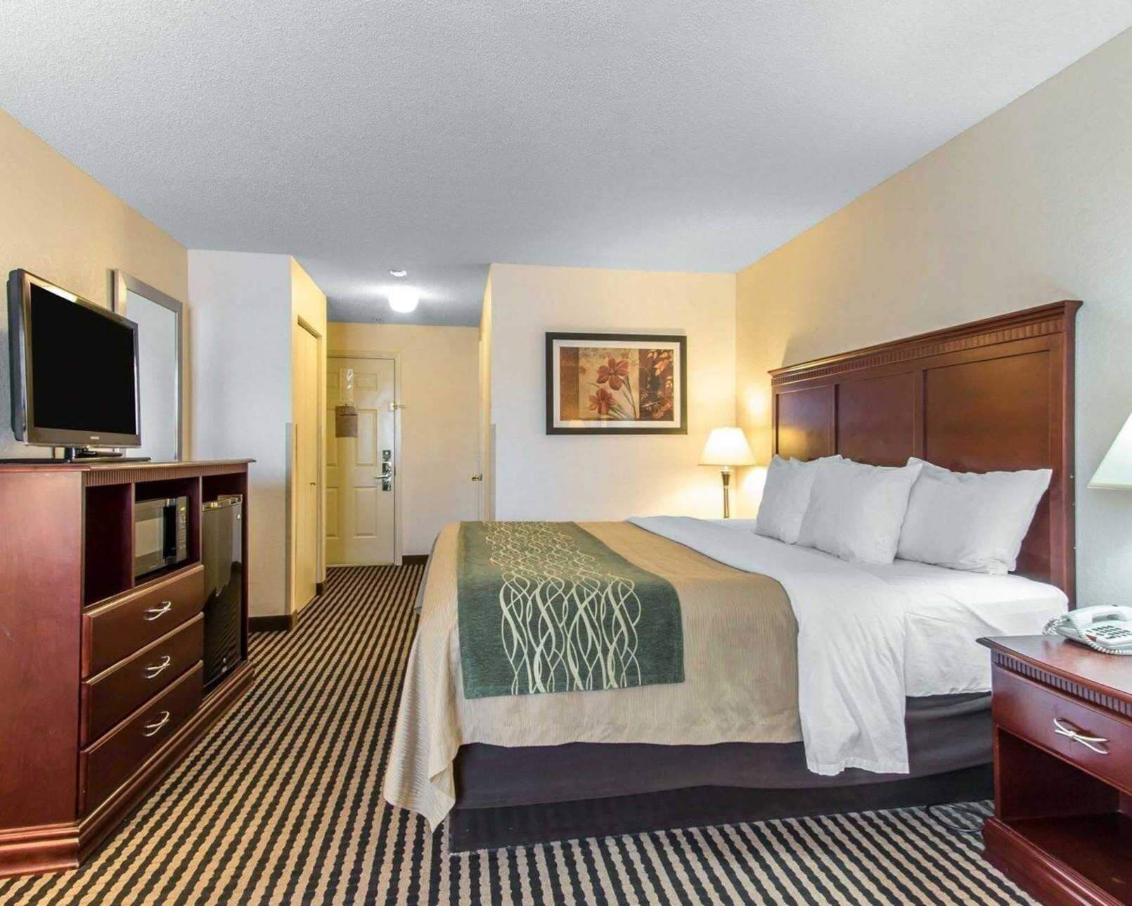 Down comforters, pillowtop beds, desk, laptop workspace