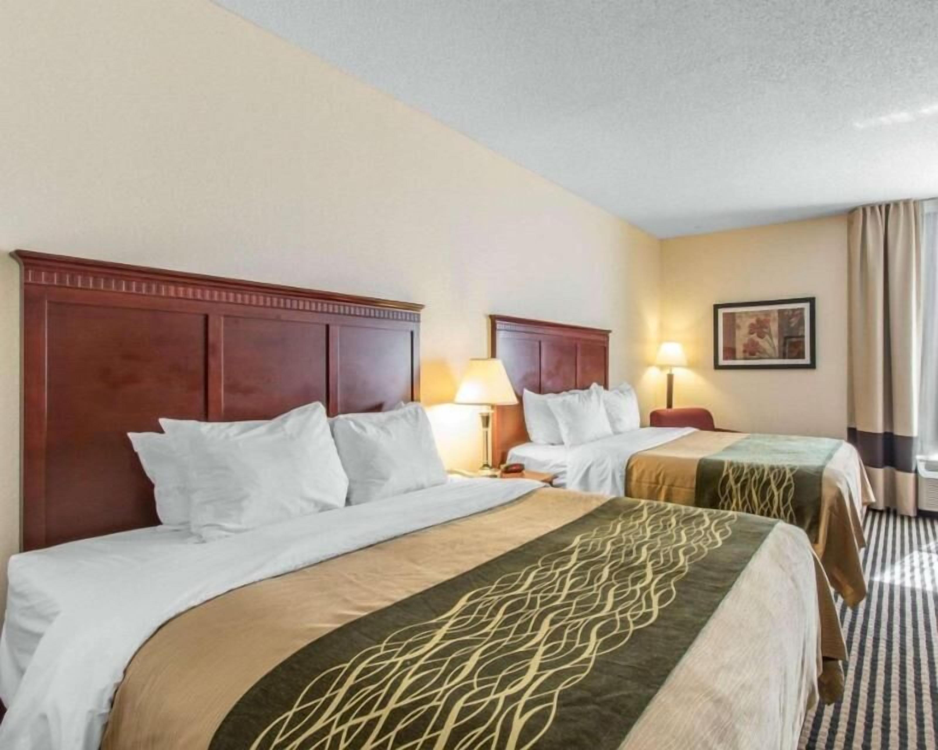 Down comforters, pillowtop beds, desk, laptop workspace