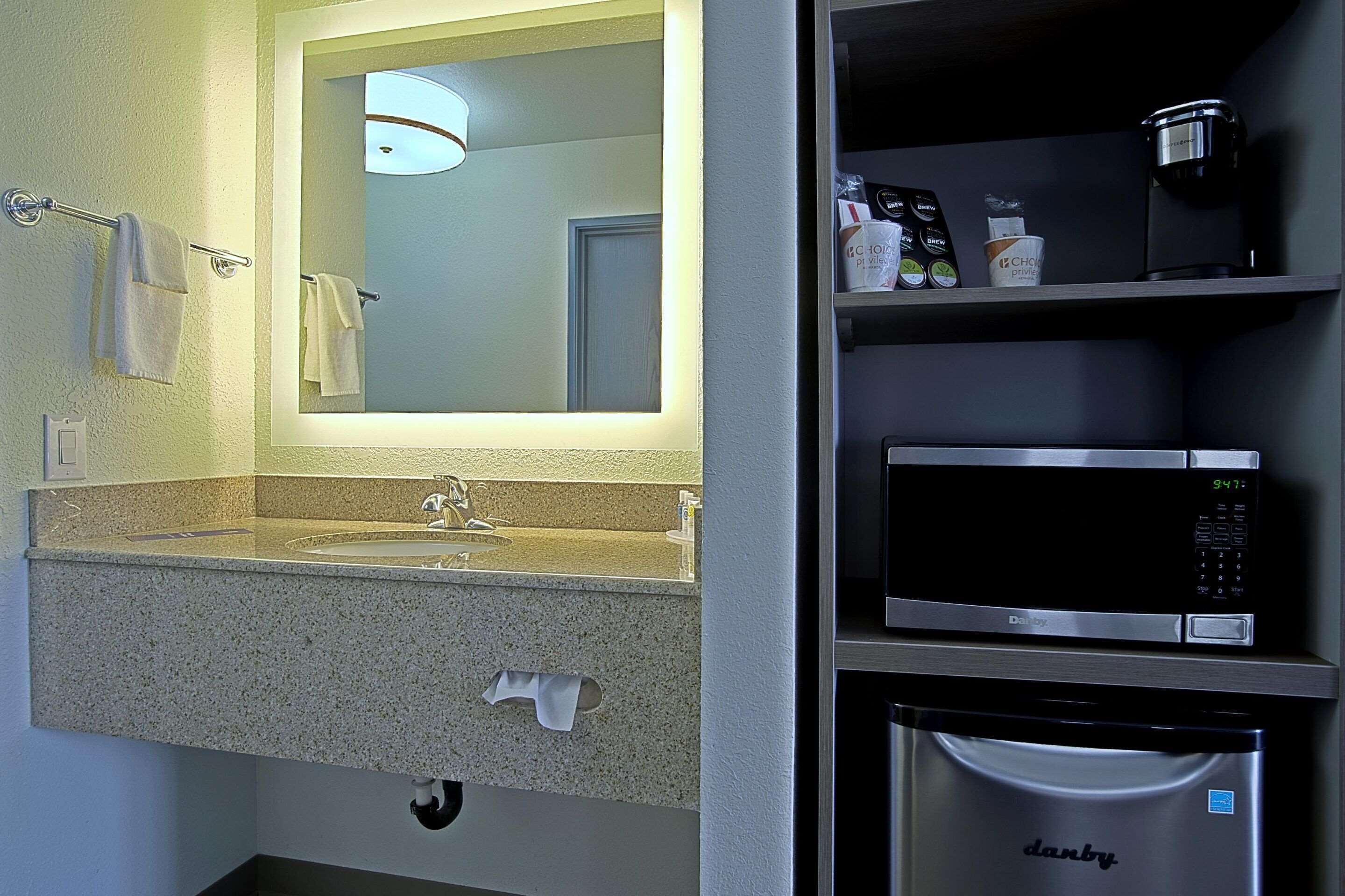 desk, laptop workspace, blackout curtains, iron/ironing board