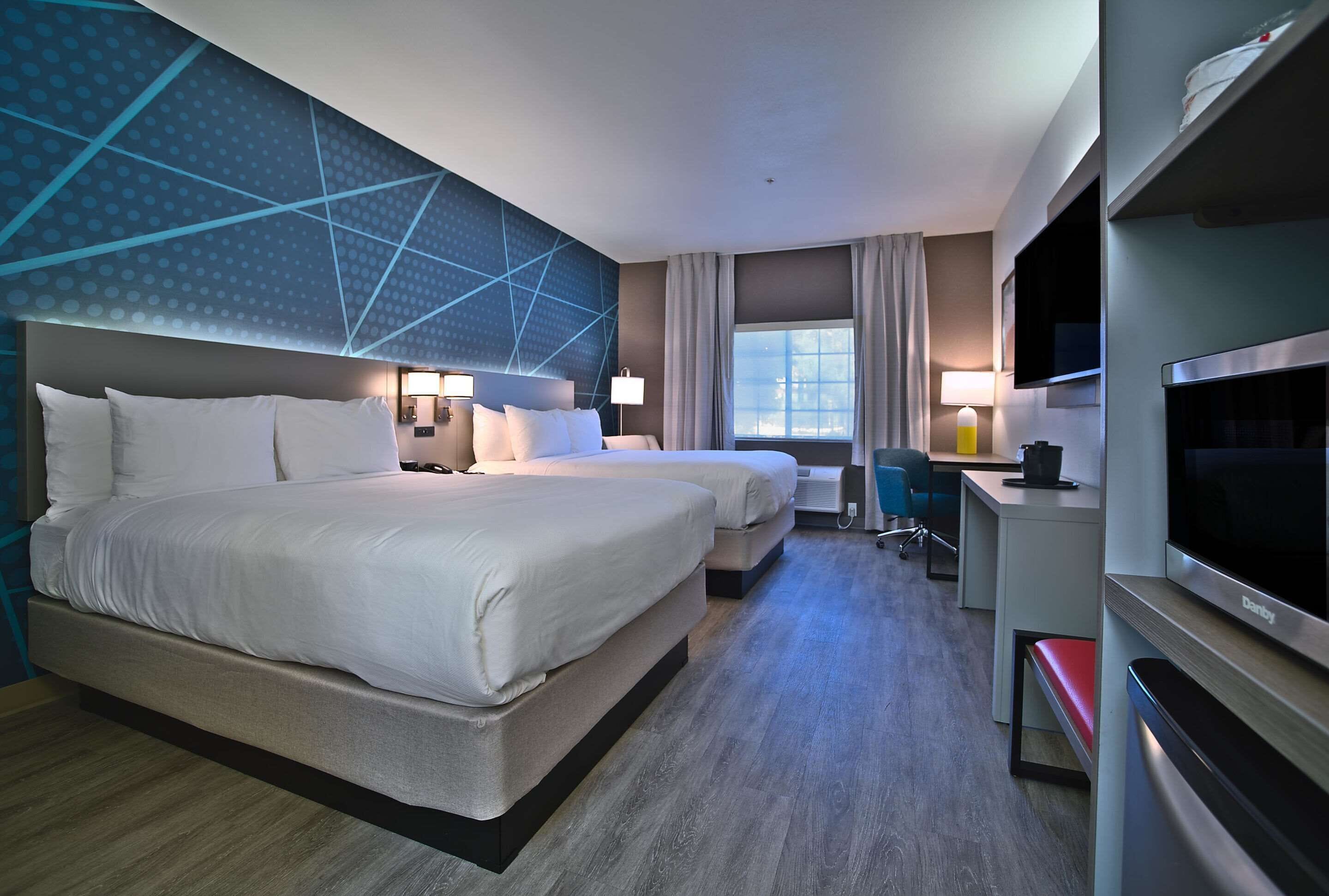 desk, laptop workspace, blackout curtains, iron/ironing board