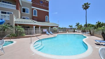 Outdoor pool, open 6:00 AM to 10:00 PM, pool umbrellas, sun loungers