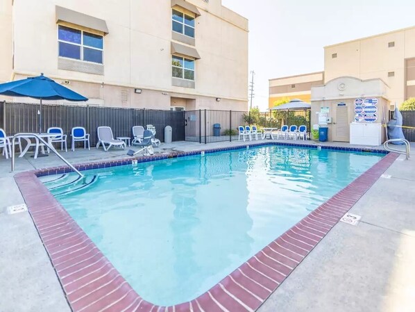 Outdoor pool, open 9:00 AM to 10 PM, sun loungers