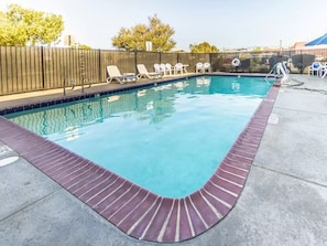 Outdoor pool, open 9:00 AM to 10 PM, sun loungers