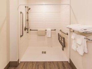 Standard Room, 1 King Bed, Roll-in Shower | Bathroom | Combined shower/tub, free toiletries, hair dryer, towels