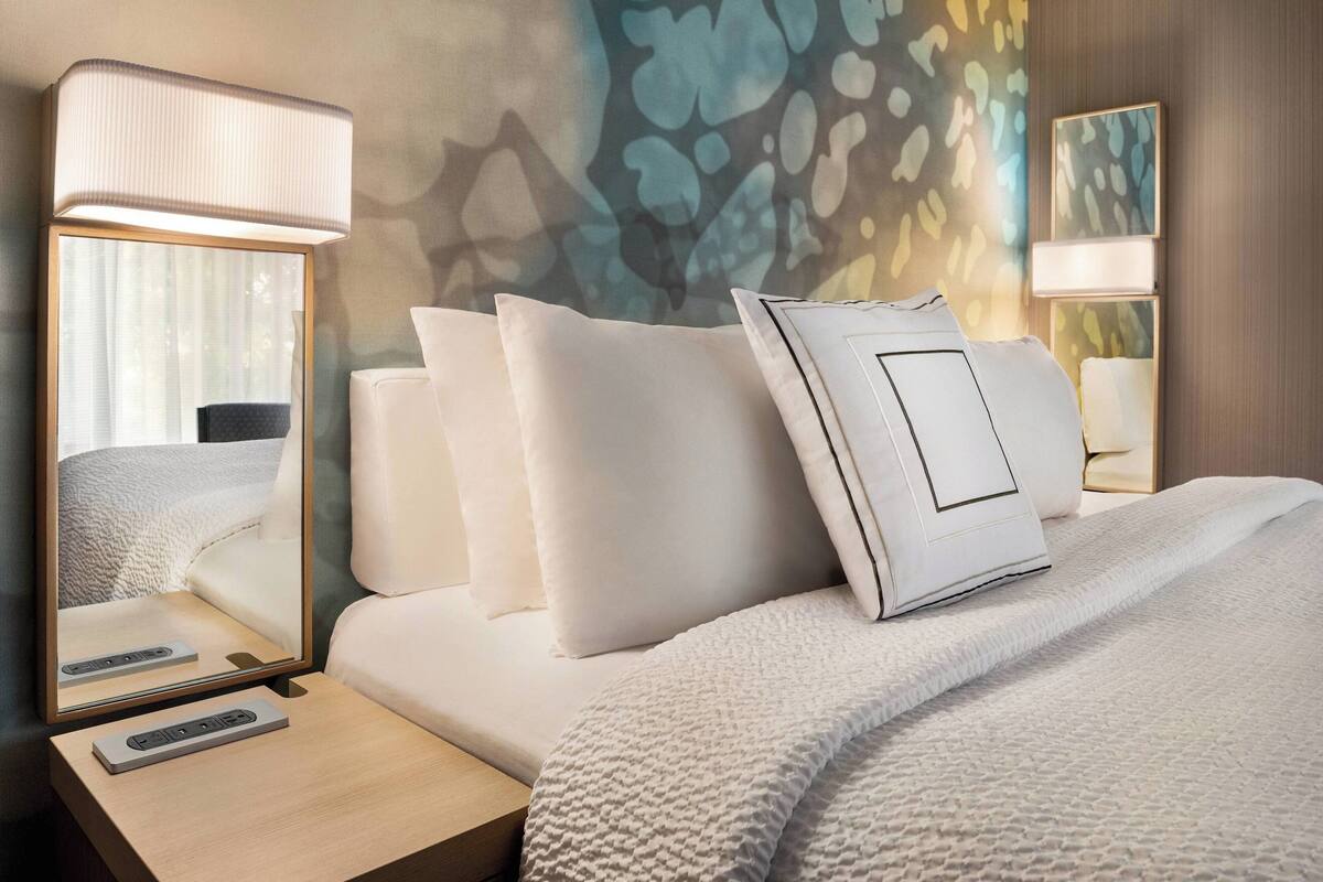 desk, laptop workspace, iron/ironing board, free cots/infant beds